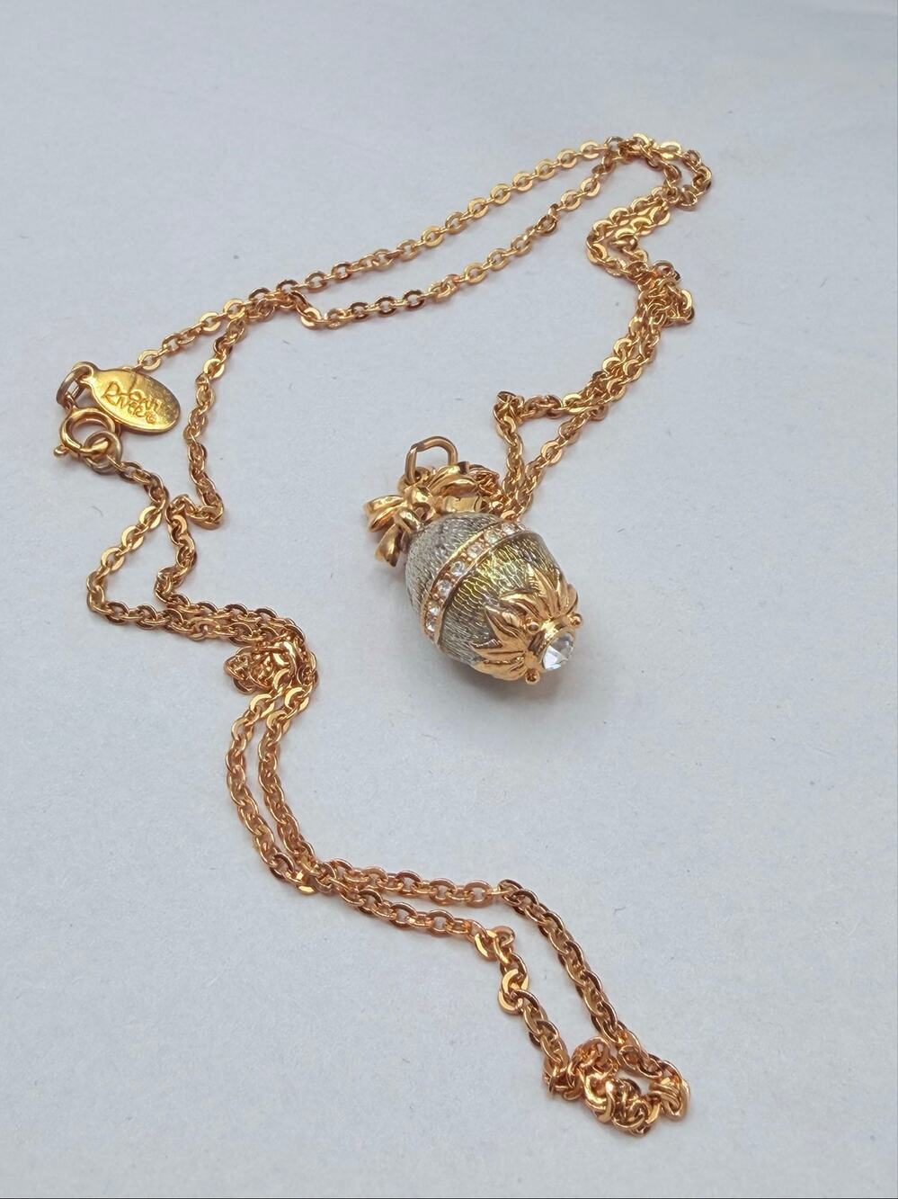 Joan Rivers Signed Crystal Egg Pendant Necklace Gold Silver/Green Tone Bow